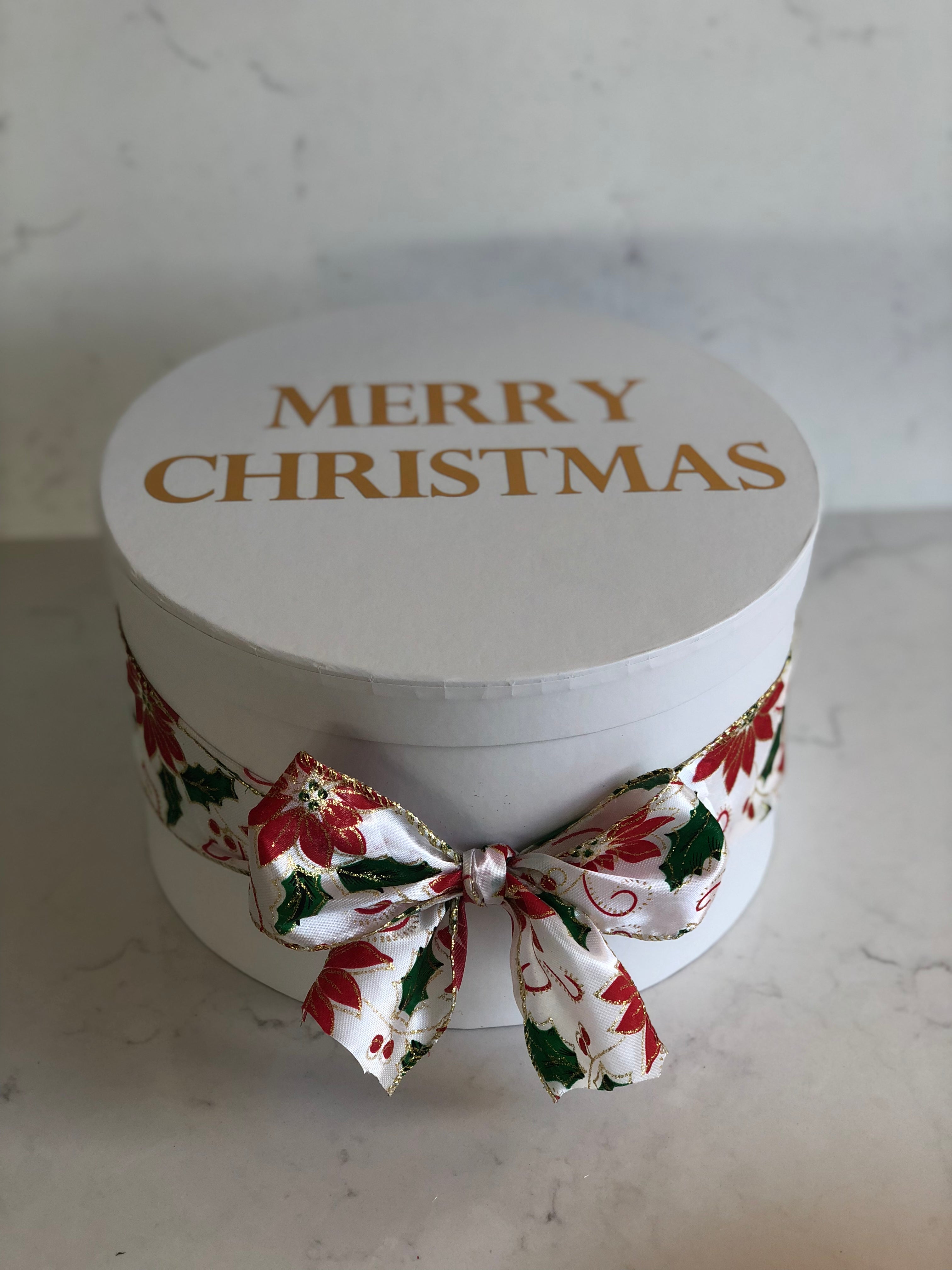 Christmas dessert and floral gift box